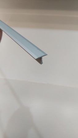 Профиль алюминиевый ПС09 стыкоперекрывающий серебро люкс (01л) 2,7м